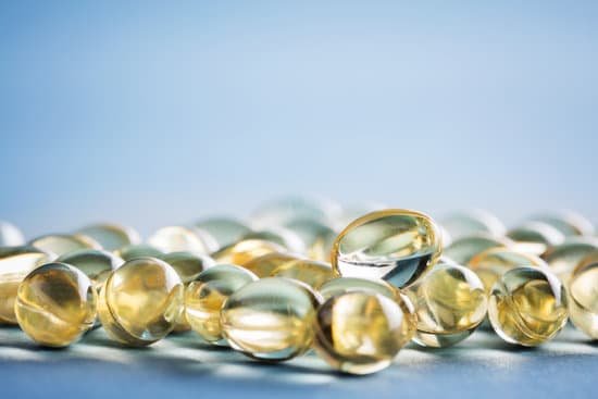 canva vitamin d capsules laying on a table. MAC1gE35DC8