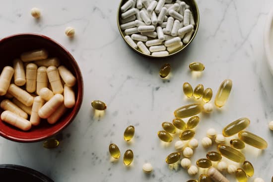canva vitamins and drugs of different sizes on various tableware on marble board