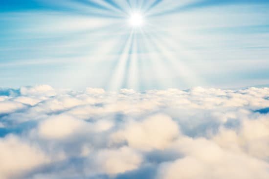 canva white clouds on blue sky with sun rays MAEE2EIXtMc
