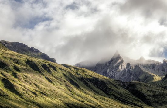 canva white clouds on top of green mountain MADGyLbHBEY