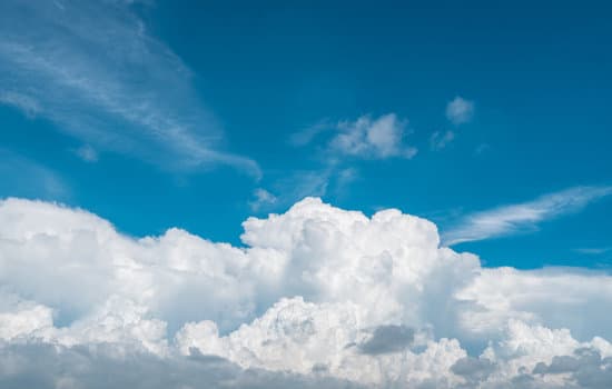 canva white fluffy clouds in the blue sky MAEPzesgfRw