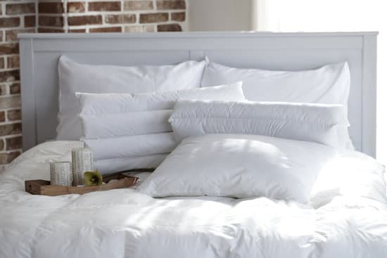 canva white pillows and blankets on bed MADQ4 3sBQE