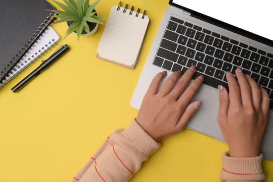 canva woman hands typing on laptop computer. MAEmuHskdVw