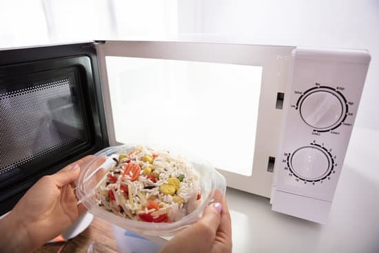 canva woman heating food in microwave oven MAC wy3HUHU