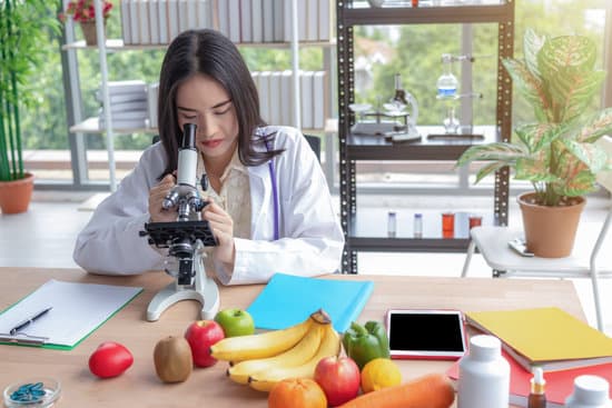 canva woman looking at the microscope MAEOzs5fQ48