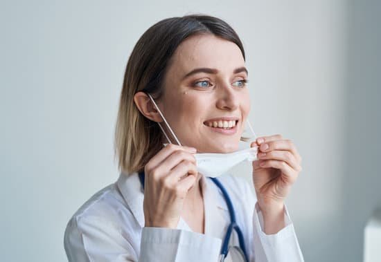 canva woman nurse in medical mask blue stethoscope light background MAEMZXWWVy4