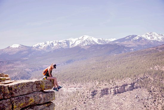 canva woman on top of mountain MADGyfvS97o
