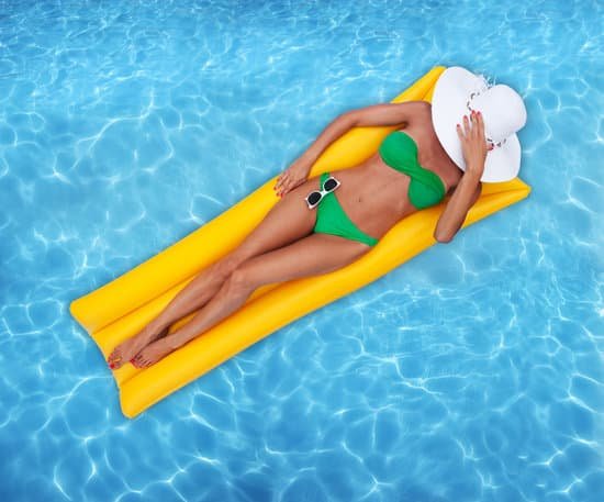 canva woman relaxing in a pool MADaqyByKAo