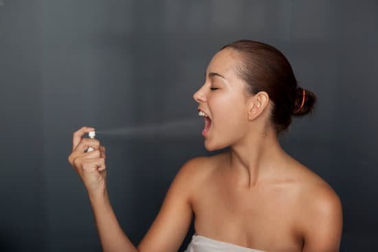 canva woman spraying breath spray in her mouth MADaFCBr9H0