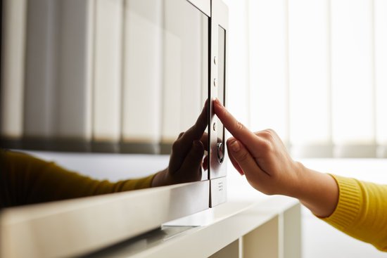 canva woman using a microwave MADFlizl6Bc