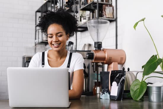 canva woman using laptop