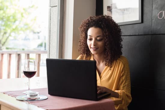 canva woman using laptop