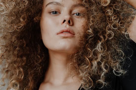canva woman with brown curly hair