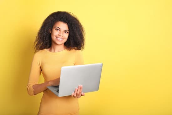 canva young african woman with laptop MAD6IKXVe48