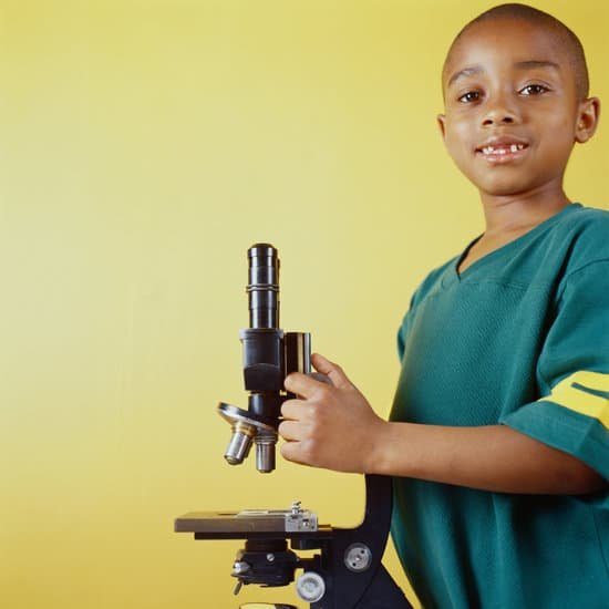 canva young boy with microscope