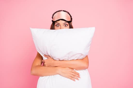 canva young gorgeous shocked lady wearing eye mask hugging pillow hiding. isolated over pink pastel background MADerAwoSTk