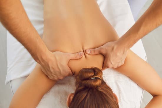 canva young woman enjoying professional back massage in modern health clinic or spa center MAEKNDJMHG0