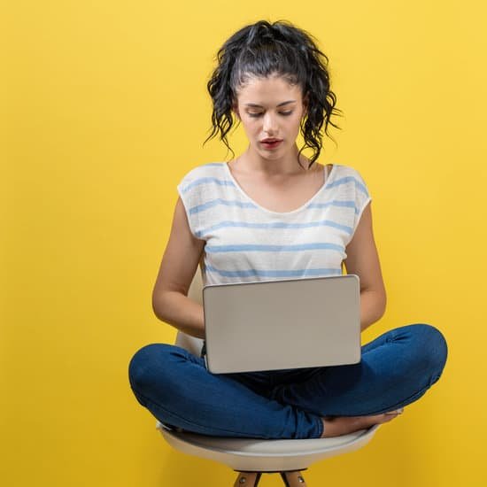 canva young woman using her laptop
